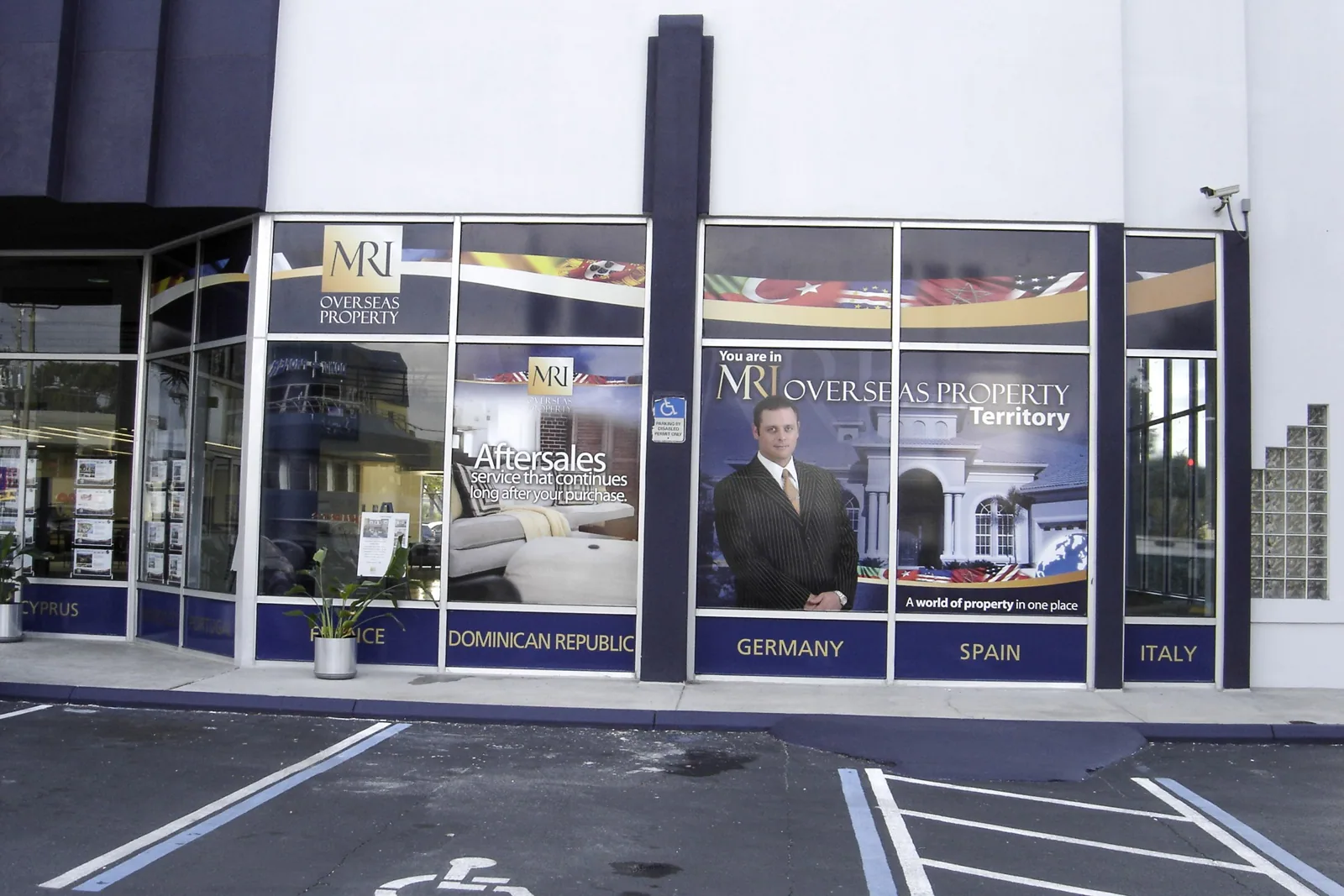 Storefront window graphics on a commercial building, from the GSI Google Business Profile