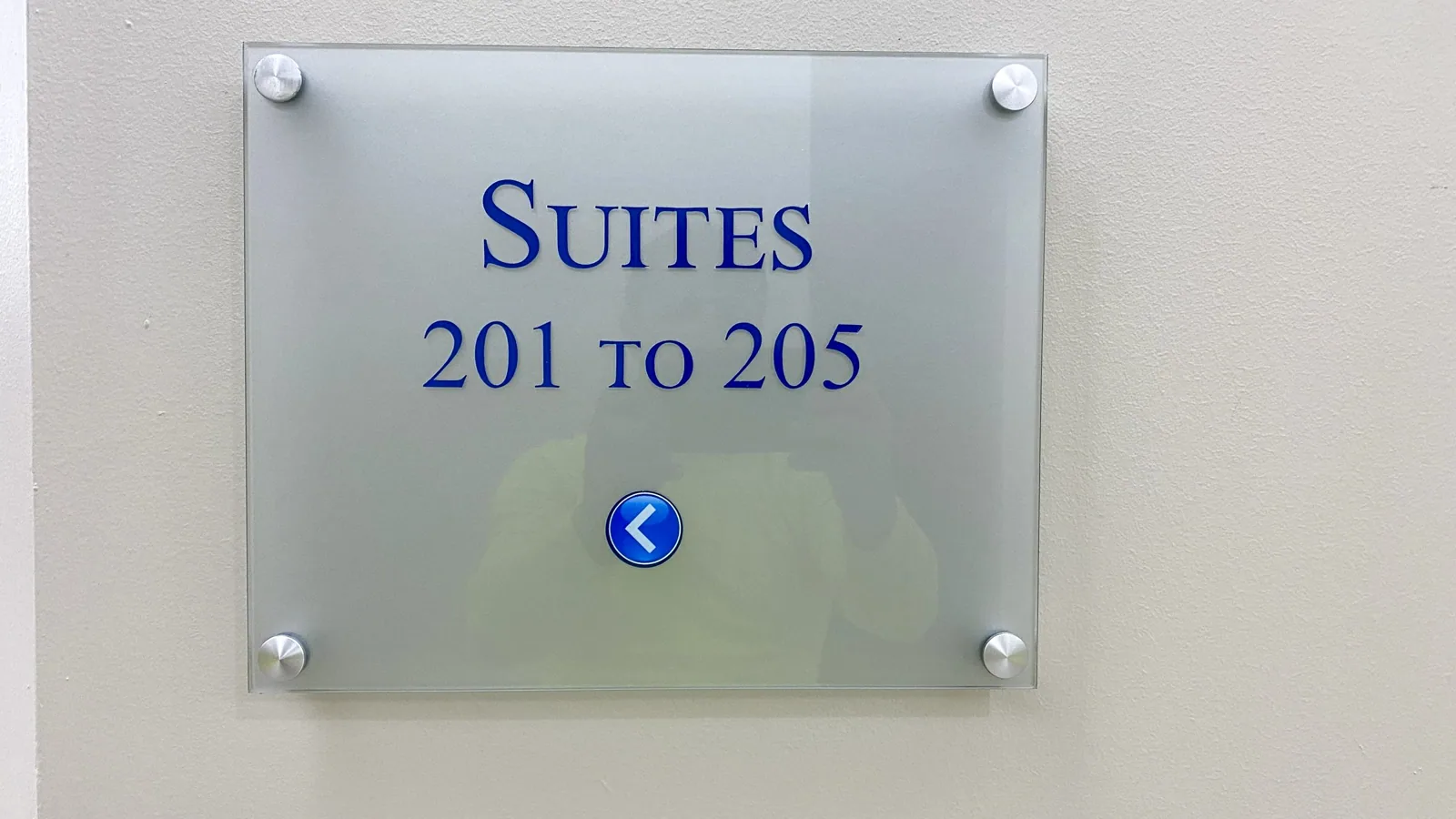 Frosted acrylic suite sign with standoffs, from the GSI Google Business Profile