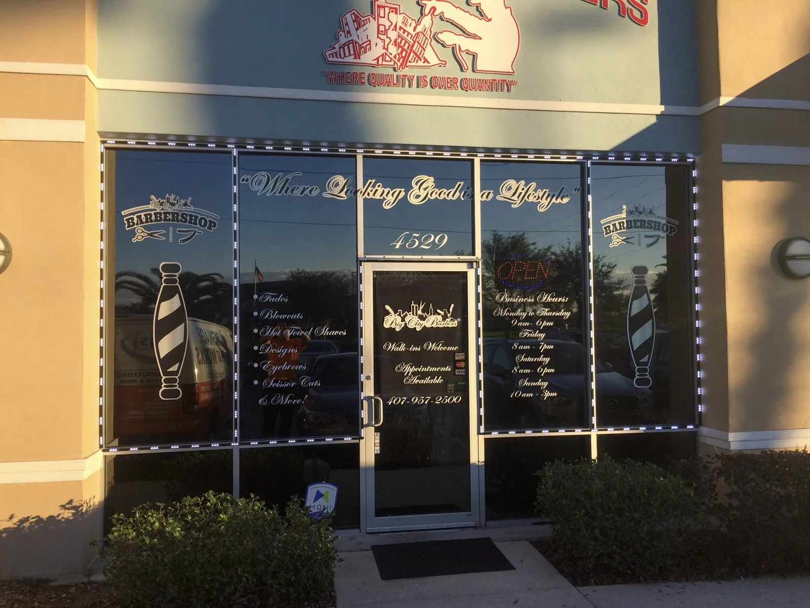 Big City Barbers — Barbershop storefront with window graphics and lettering, Big City Barbers project