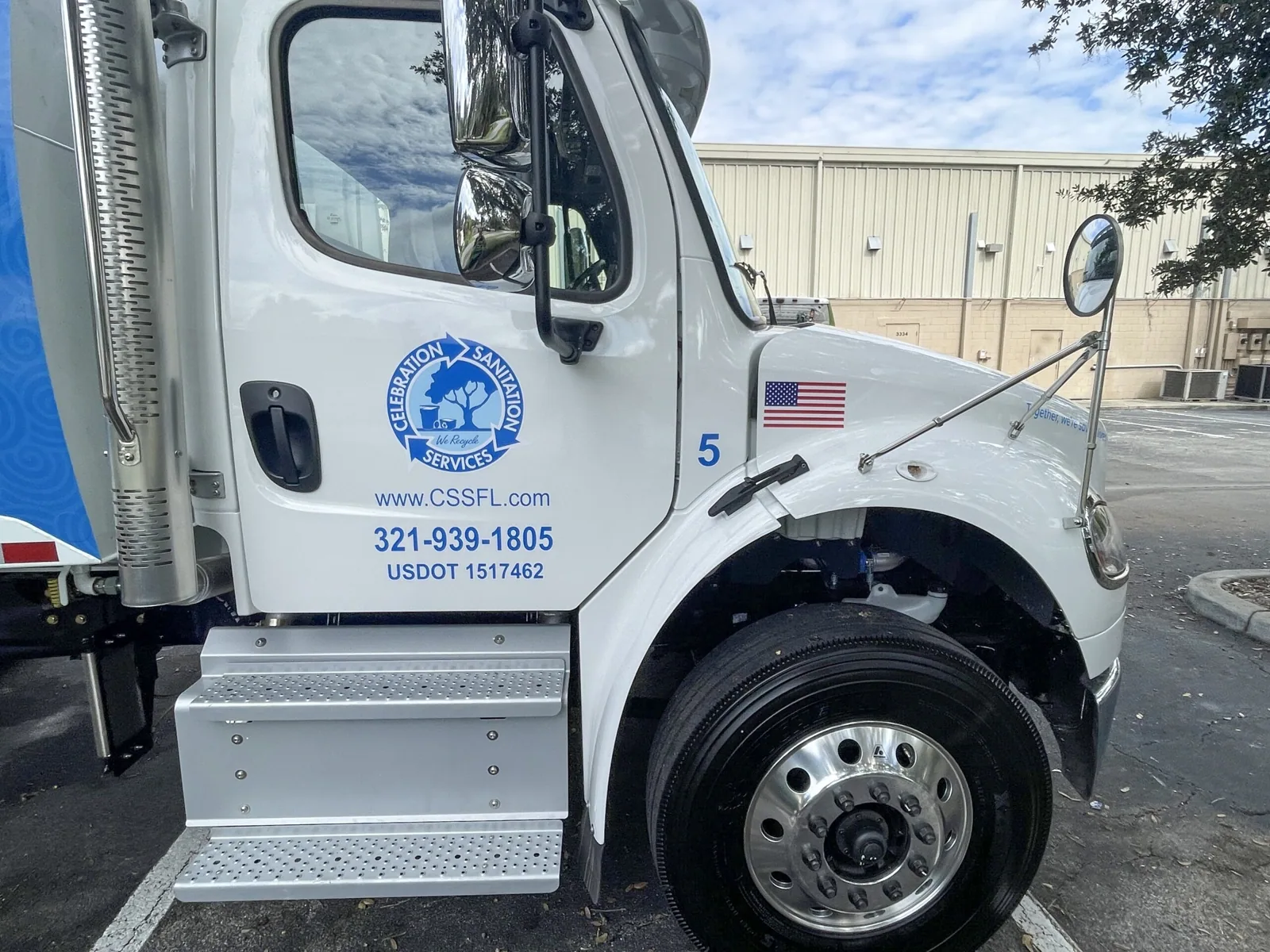 Celebration Sanitation — Truck cab door with logo, phone number and USDOT lettering, Celebration Sanitation project