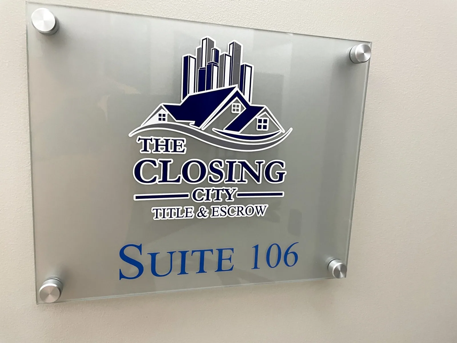 Schenk Enterprises — Frosted acrylic suite sign with standoffs for The Closing City Title & Escrow, Suite 106, Schenk Enterprises project