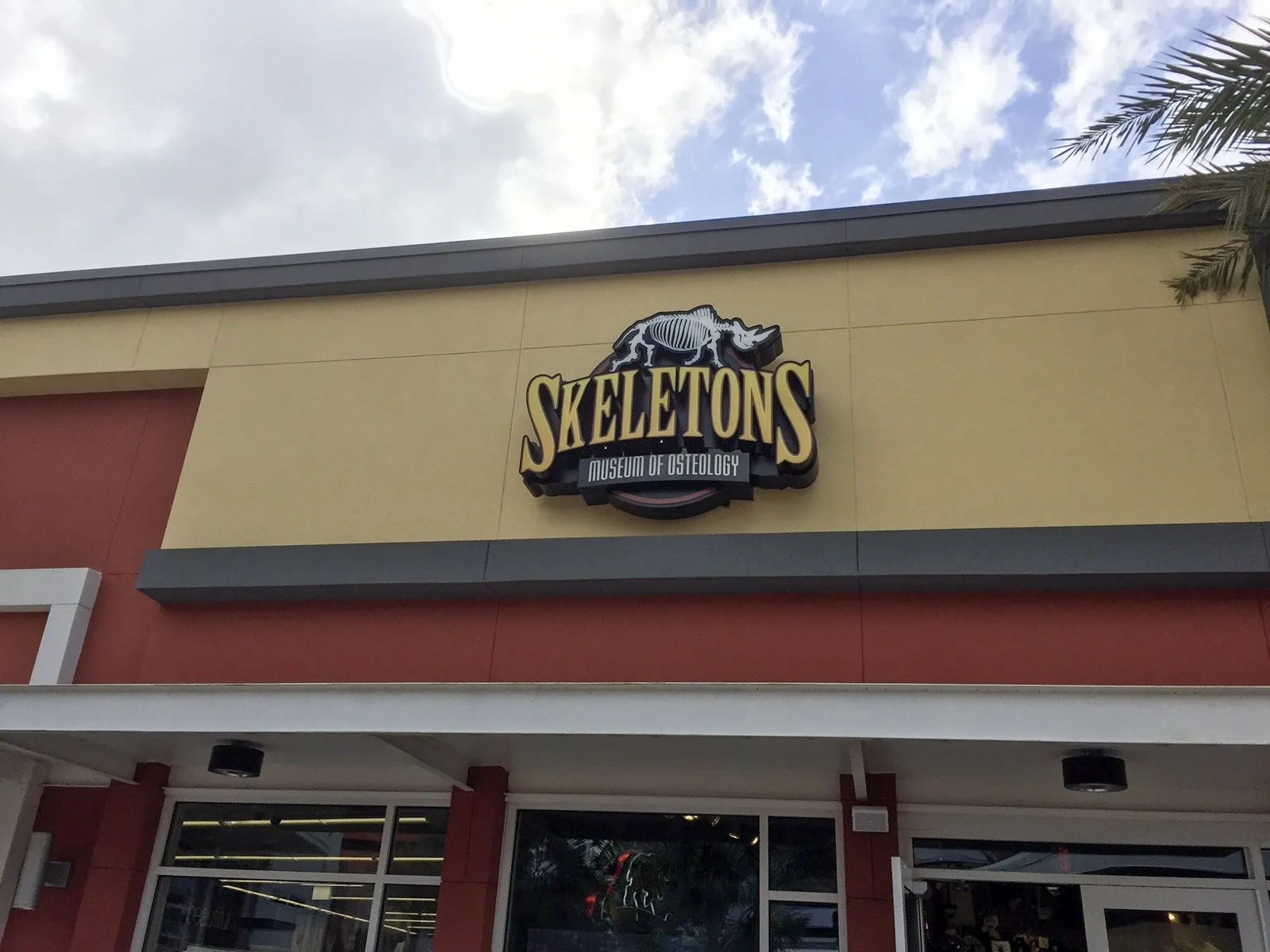Skeletons — Skeletons Museum of Osteology sign on a building facade, Skeletons project