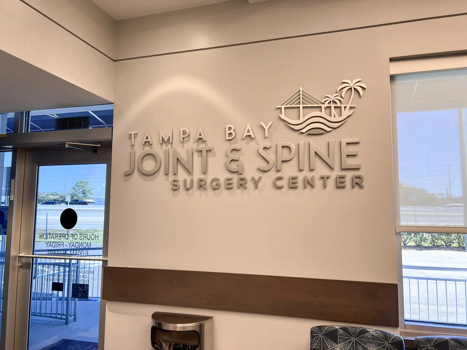 Tampa Bay Joint & Spine — Closer view of the Tampa Bay Joint & Spine Surgery Center dimensional logo on an interior wall, Tampa Bay Joint project