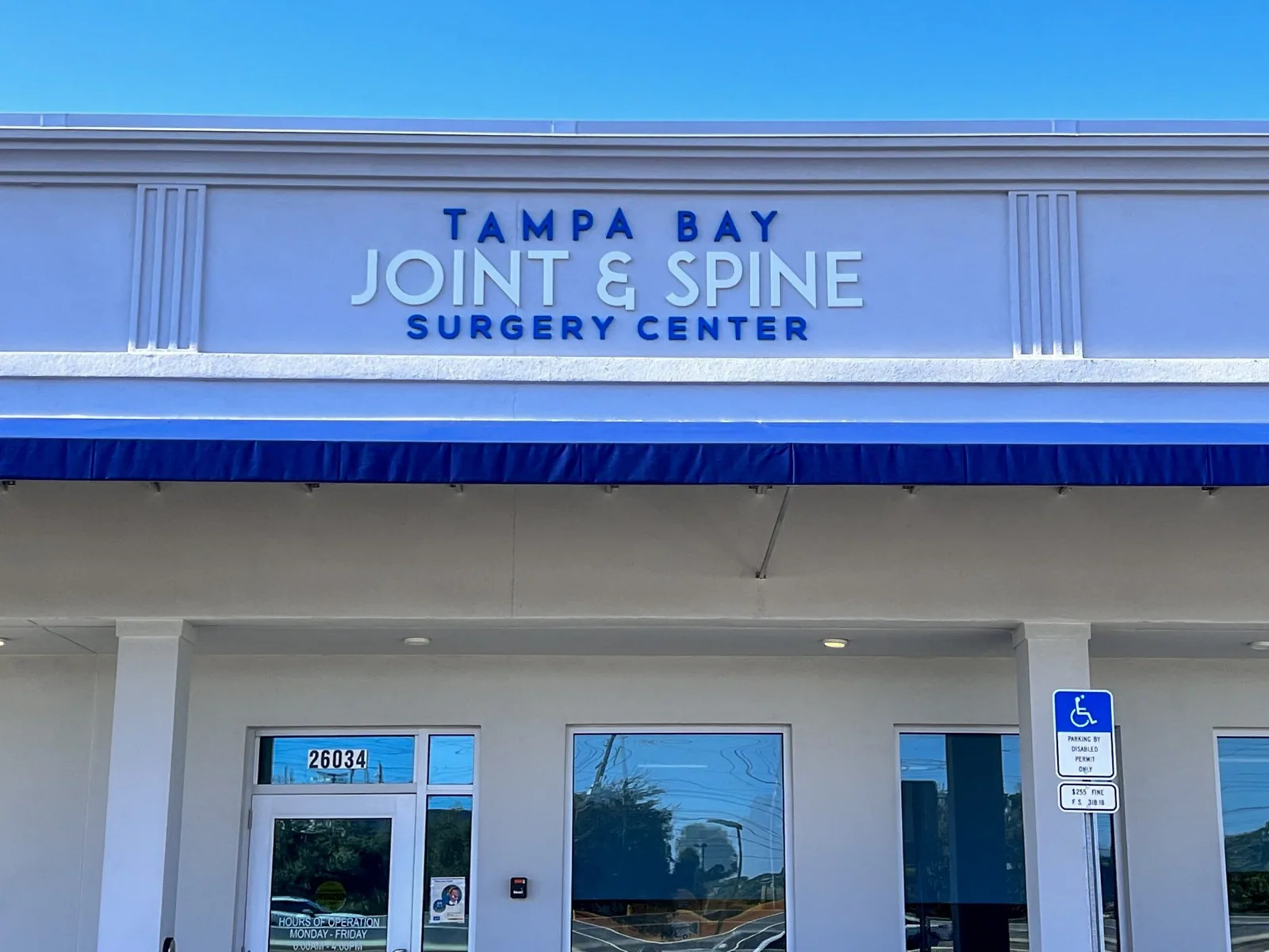 Tampa Bay Joint & Spine Surgery Center dimensional letters on the building facade above the entrance, Tampa Bay Joint project