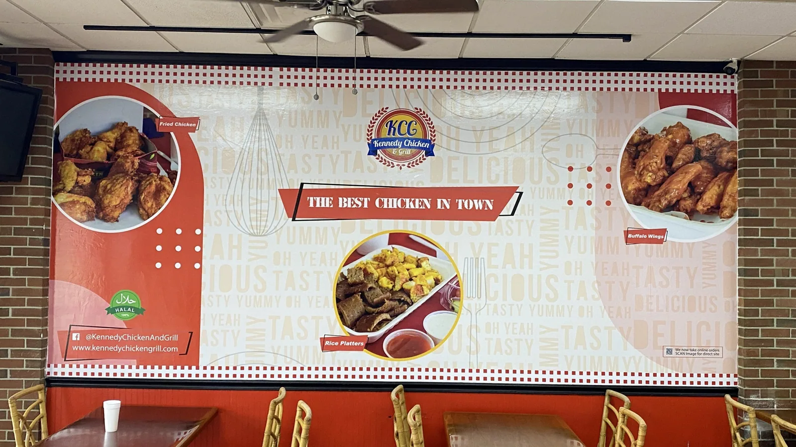 Printed wall mural with food photos in a restaurant dining room