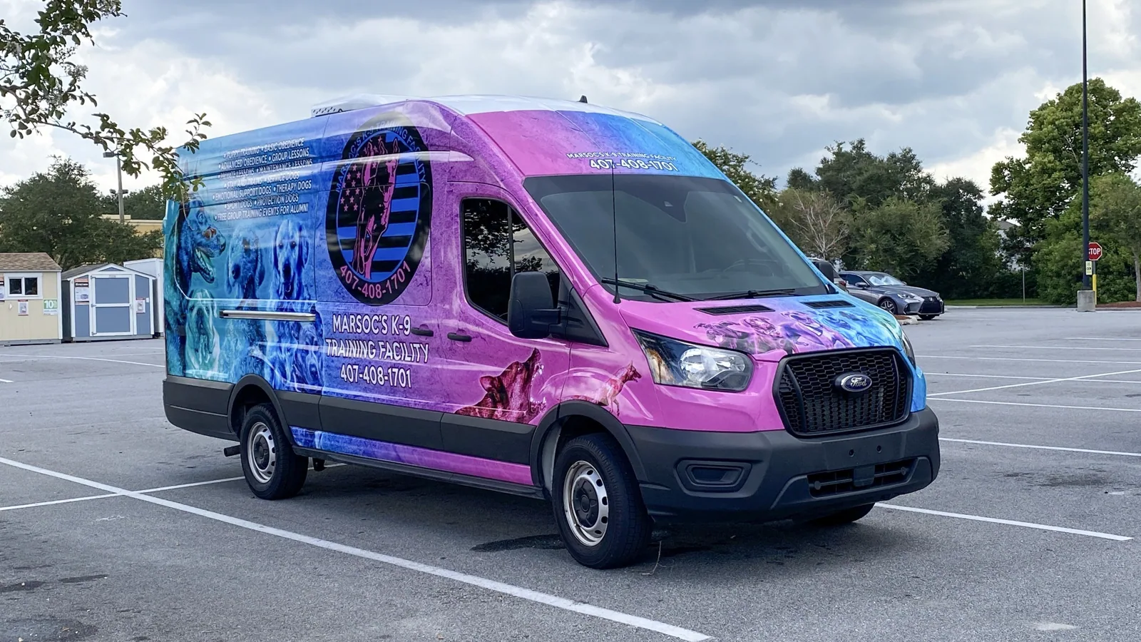 Ford cargo van with a full-color MARSOC's K-9 Training Facility wrap